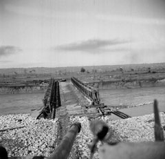 A Sqn tank crossing the Sangro over the Bailey bridge under fire